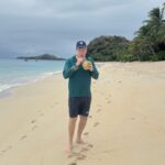Sipping fresh coconuts by the beach