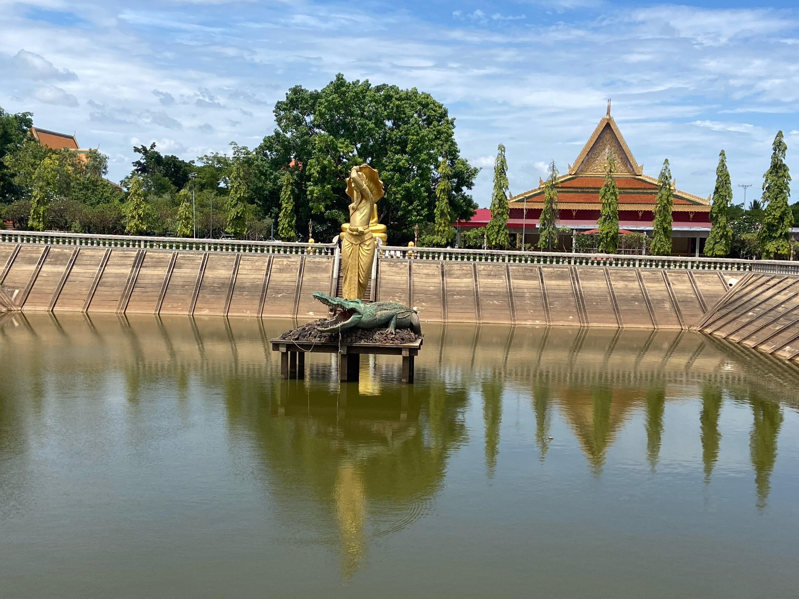 Statue over a lake in Cambodia