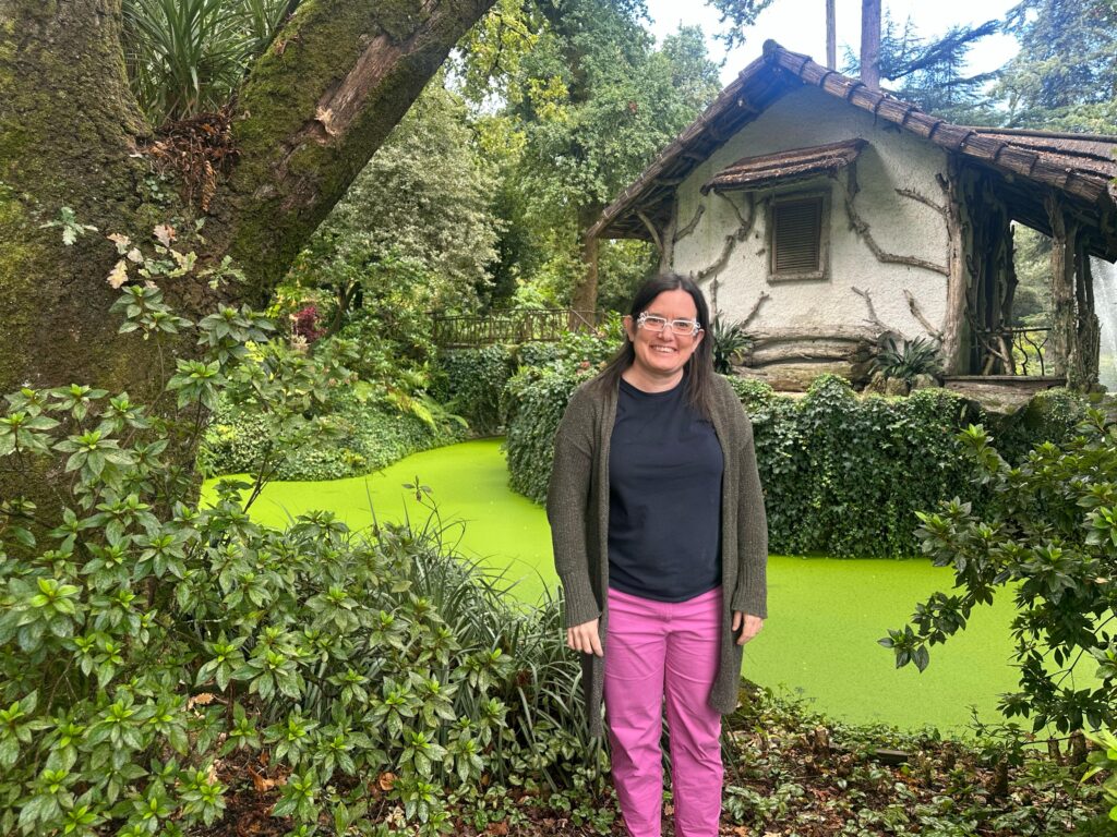 Rachel in front of the old house