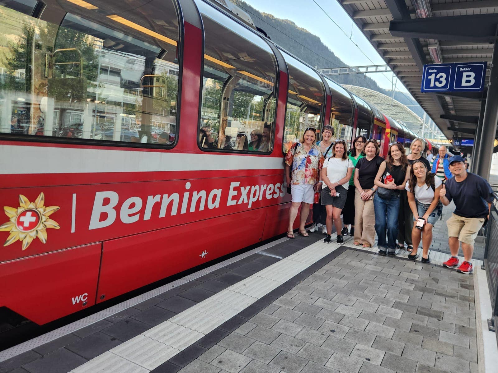 Belinda's Family in front of the train