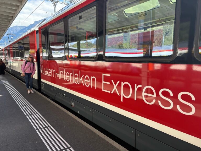 Belinda in front of the Interlaken Express